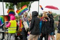 Crowd of people with rainbow flags marching for the pride parade in Tynset, Norway Royalty Free Stock Photo