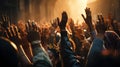 Crowd of people raising their hands in the air at a music festival Royalty Free Stock Photo