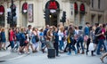 Crowd of people in the Regent street. Tourists, shoppers and business people rush time