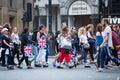 Crowd of people in the Regent street. Tourists, shoppers and business people rush time