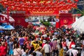 Crowd of people roams the street during celebration of Chinese New Year and Valentine's Day. Chinatown in Bangkok, Royalty Free Stock Photo