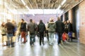 Crowd of people rushing through corridor, zoom effect, motion bl