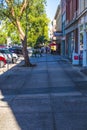 Crowd of people on the sidewalk downtown