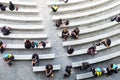 Crowd of people sitting in the park