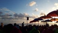 Crowd people in sunset Bali beach Indonesia