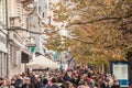 Crowd of people, tourists and locals, passing by and rushing on Wenceslas Square, at rush hour, overcrowded. Royalty Free Stock Photo