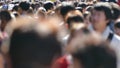 Crowd people, traveler walk on street side to subway in Tokyo, Japan