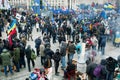 Crowd of people walking around the cold occupying Royalty Free Stock Photo