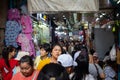 Crowd of people walking in market