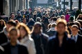 Crowd of people walking on street sidewalk