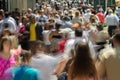 Crowd of people walking on street sidewalk Royalty Free Stock Photo