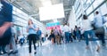 Crowd of people walking a a trade show Royalty Free Stock Photo
