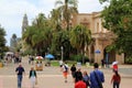Crowd of people wandering around historic Balboa Park, San Diego, California, 2016