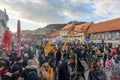 Crowd of people wearing costumes at a carnival in the streets of Samobor, Croatia