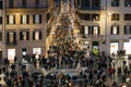 Crowd in Piazza di Spagna and Via Condotti in Rome, Italy. The palaces of fashion and the windows of luxury shops
