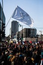 Crowd with Placard, Flags and Signs Walking in the Streets