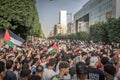 The crowd of protesters with Palestinian flags and Keffiyehs at the pro-Palestine and anti-Israel protest rally at Tunis.