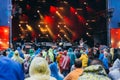 Crowd in raincoats during festival preformance Royalty Free Stock Photo