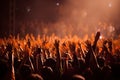 Crowd with raised hands at a live music festival. Close up