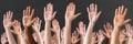 Close-up Of Raised Hands Royalty Free Stock Photo