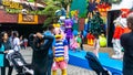 The crowd scene of animal mascots entertain the children on the stage at Sunway Lagoon theme park