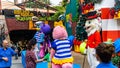 The crowd scene of animal mascots entertain the children on the stage at Sunway Lagoon theme park