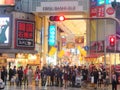 Crowd of shoppers on the busy street in Osaka shopping center. Royalty Free Stock Photo