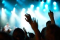 Crowd silhouette, music artist and concert audience listen to song, stage performance or celebrity rock star. Night