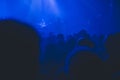 Crowd silhouette watching rock concert. Royalty Free Stock Photo