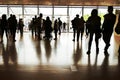 Crowd silhouettes at main entrance of convention center Royalty Free Stock Photo