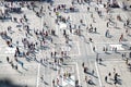 Crowd small figures of people on Piazza del Duomo square, Milan