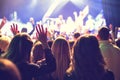 The audience watching the concert on stage. Royalty Free Stock Photo