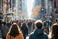 The crowd on a street of a big city walking in the same direction