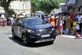 The crowd of supporters in the streets of Anduze spreading the passage of the caravan of the Tour de France