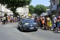 The crowd of supporters in the streets of Anduze spreading the passage of the caravan of the Tour de France