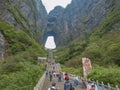 Crowd of tourist Climbing Heaven gate cave stairs on tianmen mountain national park at Zhangjiajie city china