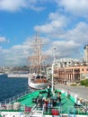 A crowd of tourists on the bow of a ferry taking pictures of the views. Traveling by ferry. Sea transport