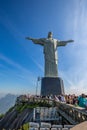 Tourists at the base of Christ the Redeemer Cristo Redentor at the top of mount corcovado in Rio de Janeiro, Brazil