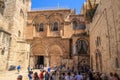 Crowd of tourists gather at the Church of the Holy Sepulcher in old meets new scene Royalty Free Stock Photo