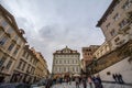 Crowd of tourists on a square on Nerudova street, a pedestrian alley of Hradcany hill, on the Prague Castle, surrounded by people Royalty Free Stock Photo