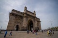 Crowd of tourists visiting the Gateway of India in Mumbai, India