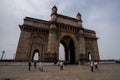Crowd of tourists visiting the Gateway of India in Mumbai, India