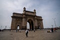 Crowd of tourists visiting the Gateway of India in Mumbai, India
