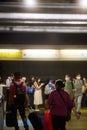 A crowd waiting for the underground train in old Hung Hom Station, Hong Kong Royalty Free Stock Photo