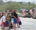 Crowd watches a parade in small town America