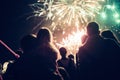 Crowd watching fireworks and celebrating new year eve