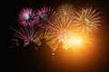 Crowd watching fireworks and celebration. Happy family sitting on floor and watching the fireworks Celebration at night on New Royalty Free Stock Photo