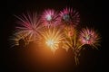 Crowd watching fireworks and celebration. Happy family sitting on floor and watching the fireworks Celebration at night on New Royalty Free Stock Photo