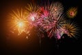 Crowd watching fireworks and celebration. Happy family sitting on floor and watching the fireworks Celebration at night on New Royalty Free Stock Photo