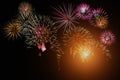 Crowd watching fireworks and celebration. Happy family sitting on floor and watching the fireworks Celebration at night on New Royalty Free Stock Photo